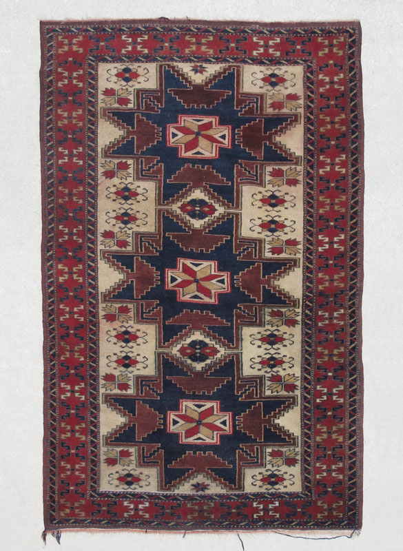 Appraisal: TURKISH STAR KAZAK HAND KNOTTED WOOL RUG ' '' x