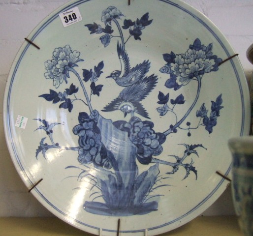 Appraisal: A blue and white large dish painted with birds amongst