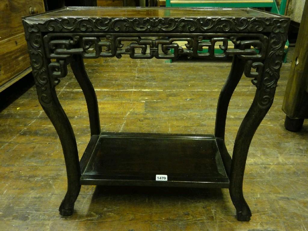 Appraisal: A Chinese rosewood two tier occasional table of rectangular form