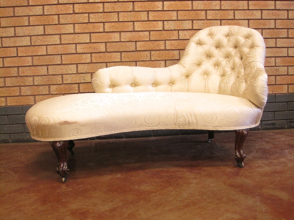 Appraisal: A Victorian rosewood framed Chaise Longue with cream patterned deep