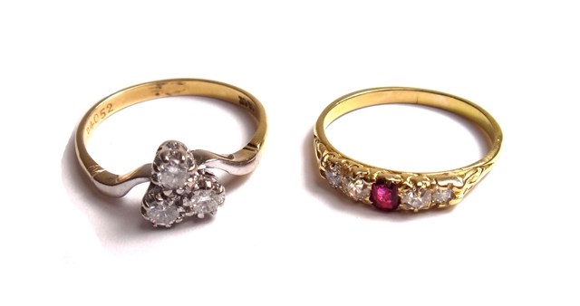 Appraisal: A gold and diamond set three stone ring in a