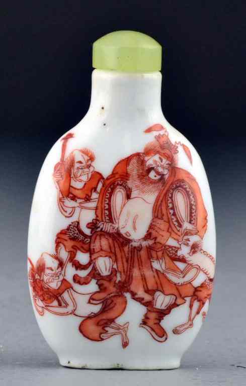 Appraisal: Chinese Qing Iron Red And White Porcelain Snuff BoFinely painted