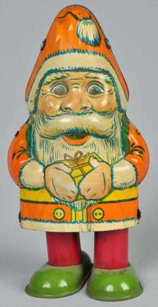 Appraisal: Tin Litho Chein Santa Clockwork Toy Description When wound Santa