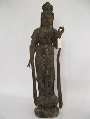 Appraisal: CHINESE CARVED AND POLYCHROMED WOOD FLOOR SCULPTURE the standing figure