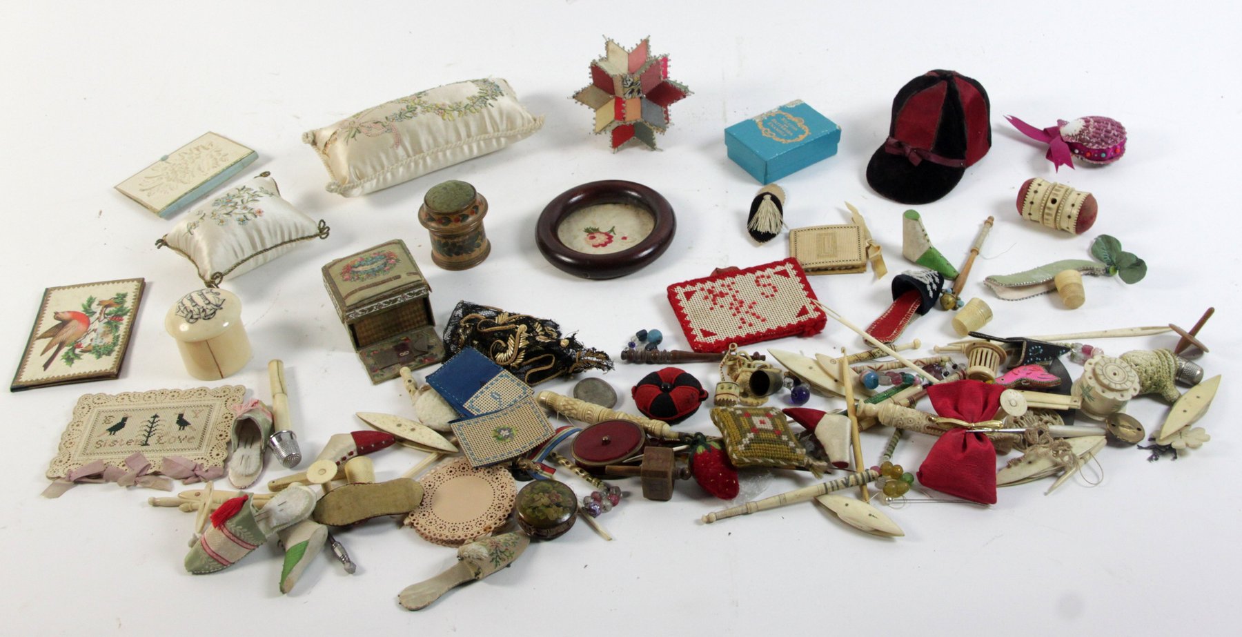 Appraisal: A large collection of needlework paraphernalia including lace bobbins thimble