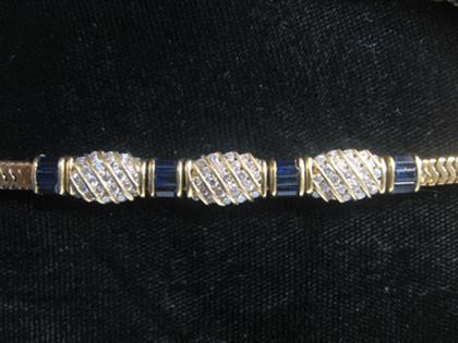 Appraisal: karat yellow gold sapphire and diamond bracelet Serpentine style link