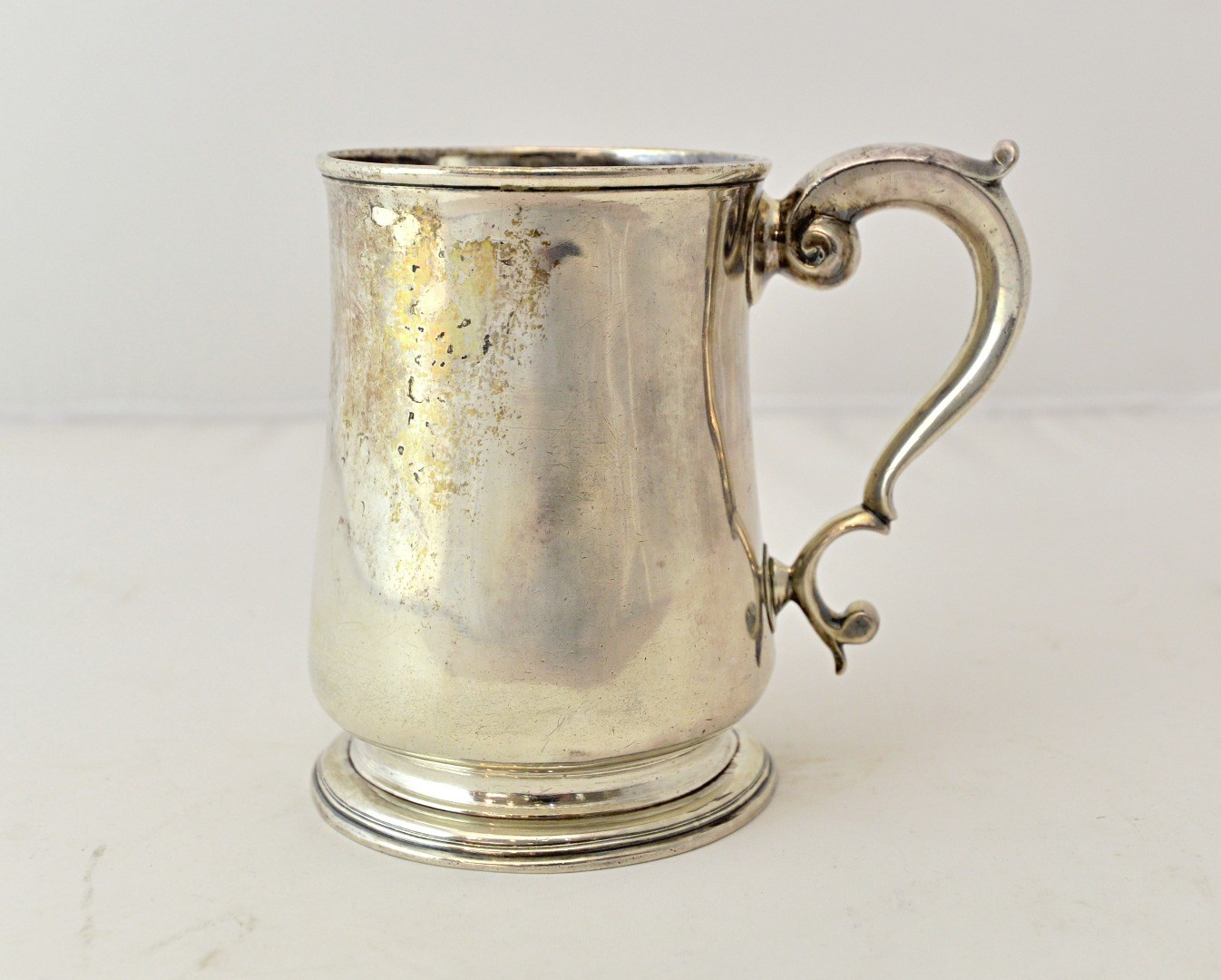 Appraisal: A George II silver mug of baluster form having a