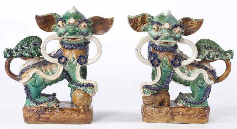 Appraisal: Pair of Large Chinese Foo Dogscirca s ceramic in multi-color