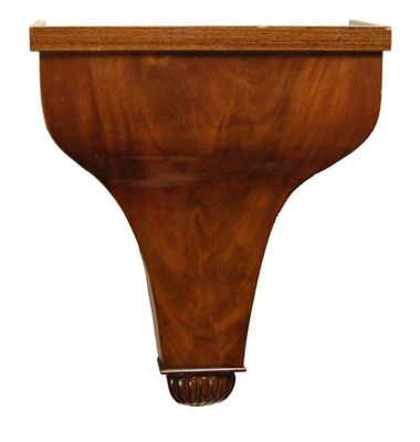 Appraisal: A continental mahogany veneered wall bracket of ogee form with