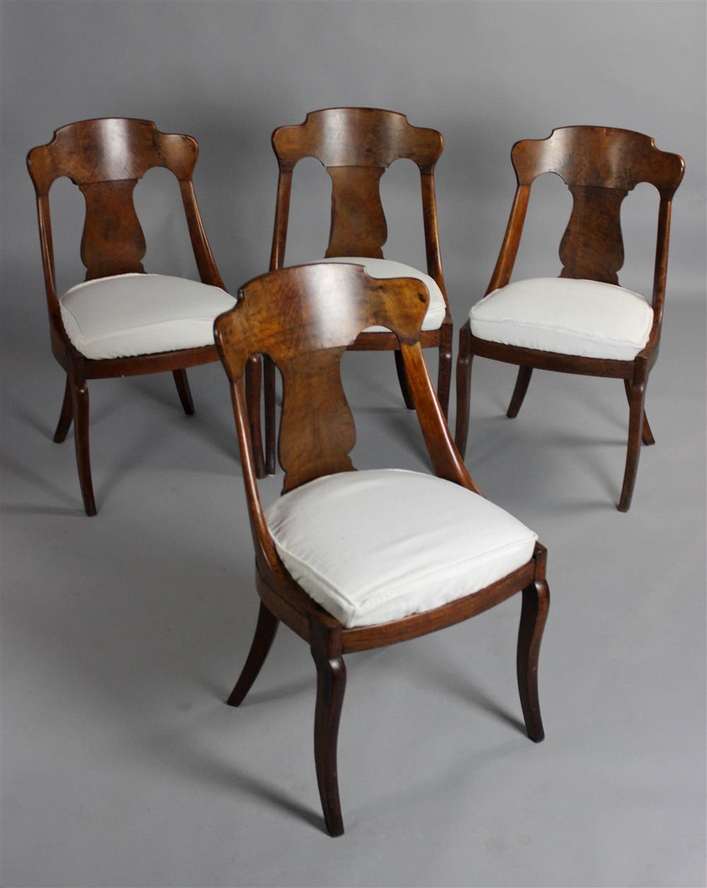 Appraisal: SET OF FOUR MAHOGANY GONDOLA STYLE CHAIRS having a shaped