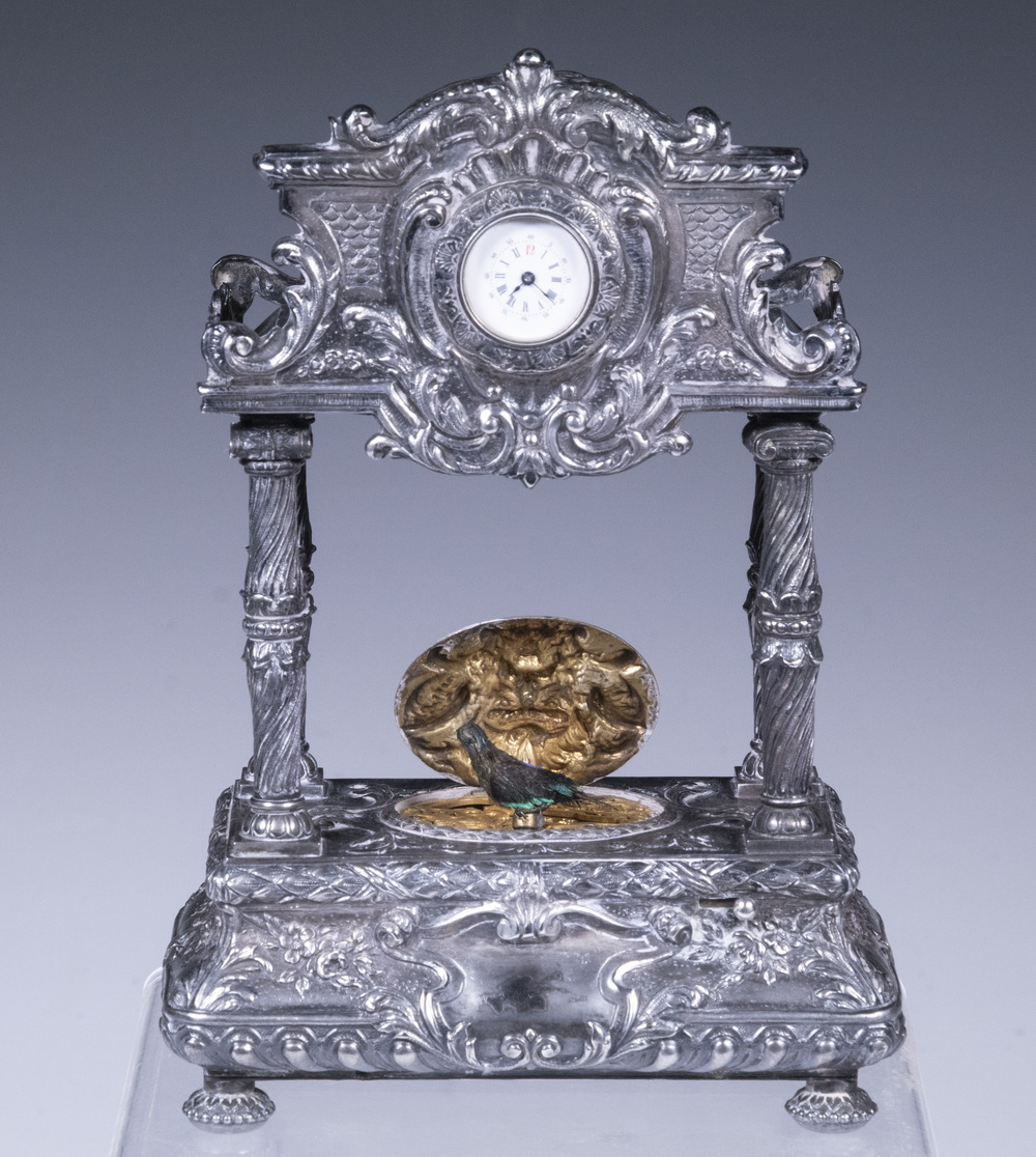 Appraisal: SILVER SINGING BIRD AUTOMATON WITH CLOCK -Silver Wind-Up Singing Bird