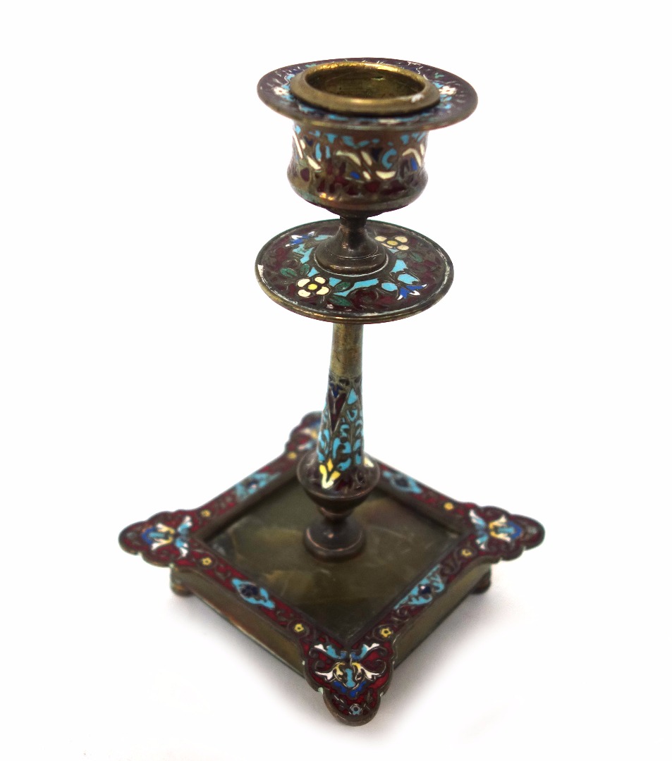 Appraisal: A French Champleve enamel and gilt metal candlestick circa with