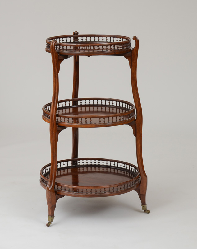 Appraisal: VICTORIAN MAHOGANY THREE-TIERED TAG RE Fitted with three graduating circular