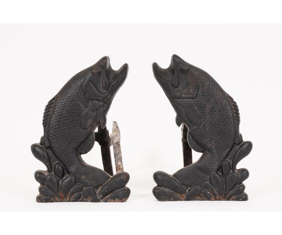 Appraisal: Pair of cast iron fish andirons circa h x w