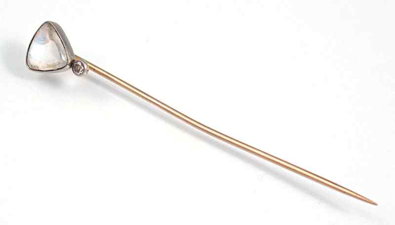 Appraisal: PLATINUM AND GOLD MOONSTONE STICK PIN Ca K yellow gold