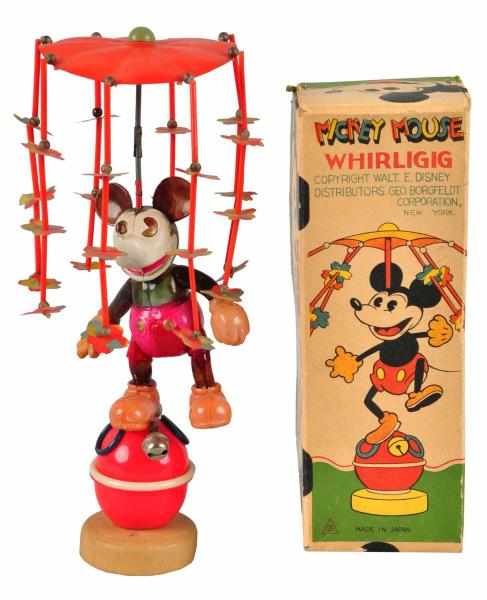 Appraisal: Celluloid Disney Mickey Whirligig Wind-Up Toy Description Japanese Early s