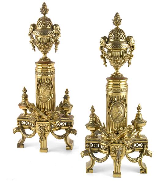 Appraisal: A pair of Louis XVI style gilt brass andirons th