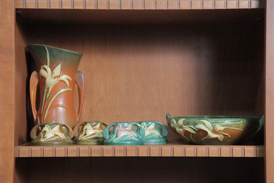 Appraisal: FOUR PIECES OF ROSEVILLE POTTERY All in Zephyr Lily pattern