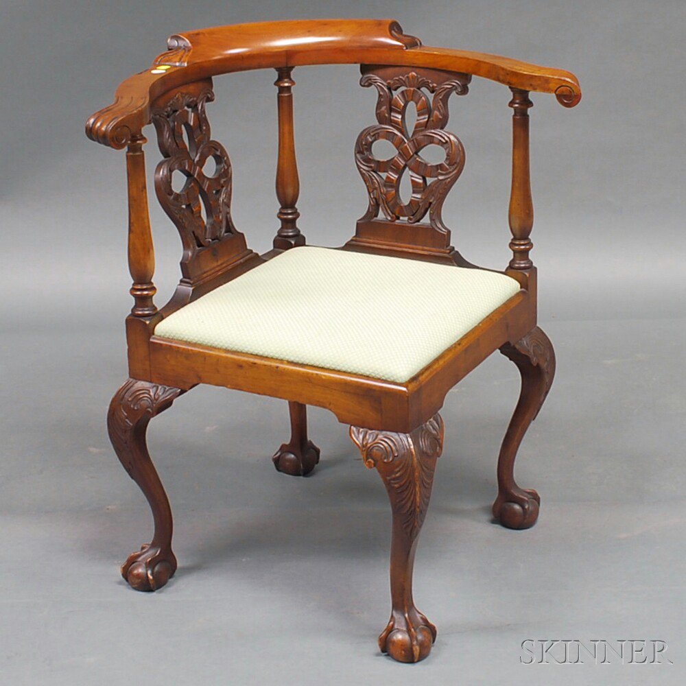 Appraisal: Chippendale-style Mahogany Roundabout Chair the shaped arms supported by ring-