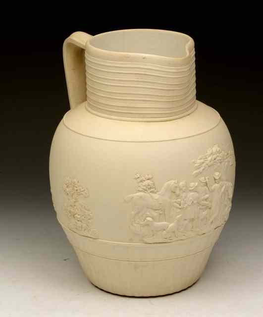 Appraisal: A TURNER FELSPATHIC STONEWARE LARGE JUG decorated figures carousing outside