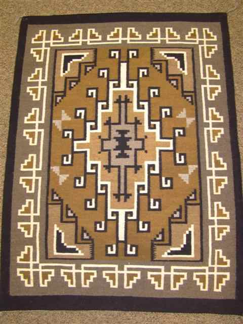 Appraisal: NAVAJO GRAY HILLS RUG light brown brown cream grey and