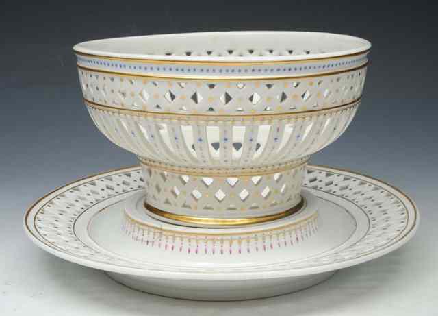 Appraisal: A NYMPHENBURG DESSERT BASKET and stand circa - in the