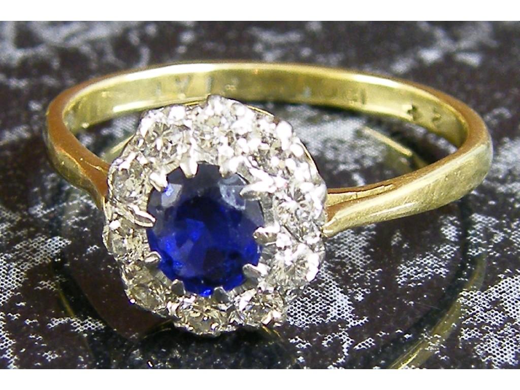 Appraisal: ct sapphire and diamond cluster ring size N O