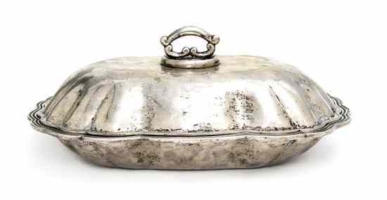 Appraisal: A Continental Silver Covered Entree Dish of scalloped oval form