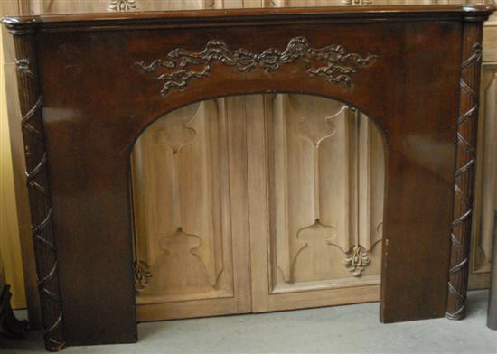 Appraisal: CARVED MAHOGANY FIREPLACE SURROUND With swag decorations H W D