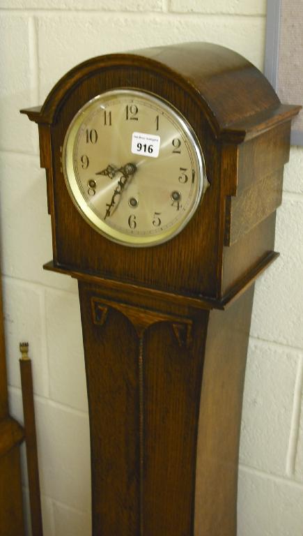 Appraisal: 's oak three train grandmother clock the silvered dial with