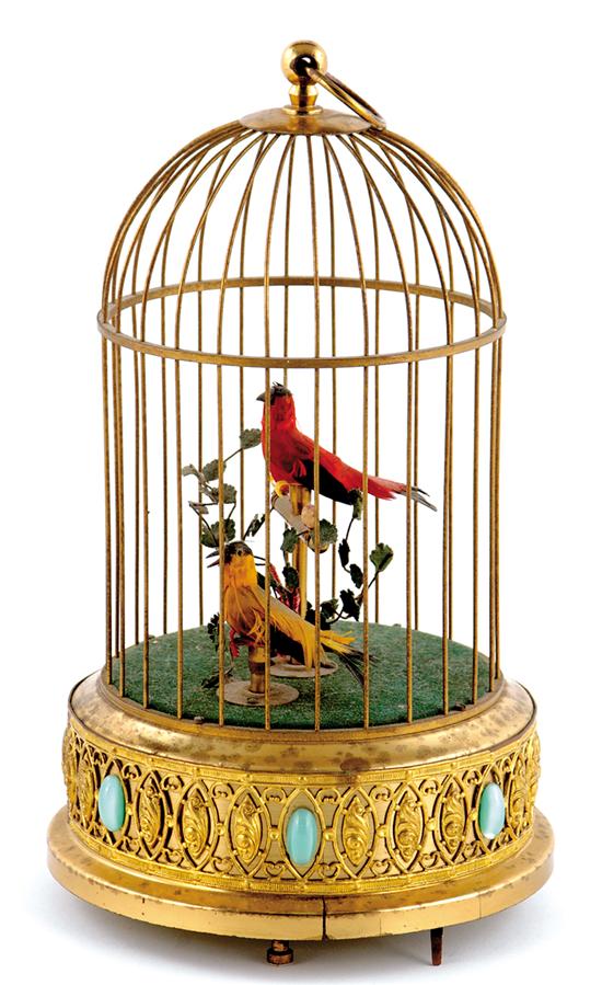 Appraisal: German musical bird automaton th century two animated birds perched