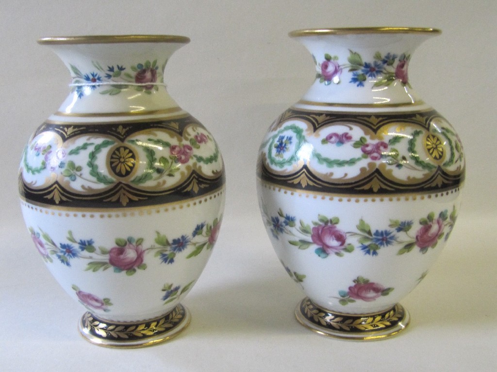 Appraisal: Pair of German porcelain vases with flower decoration