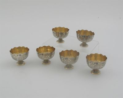 Appraisal: A set of six early th century Turkish parcel-gilt coffee