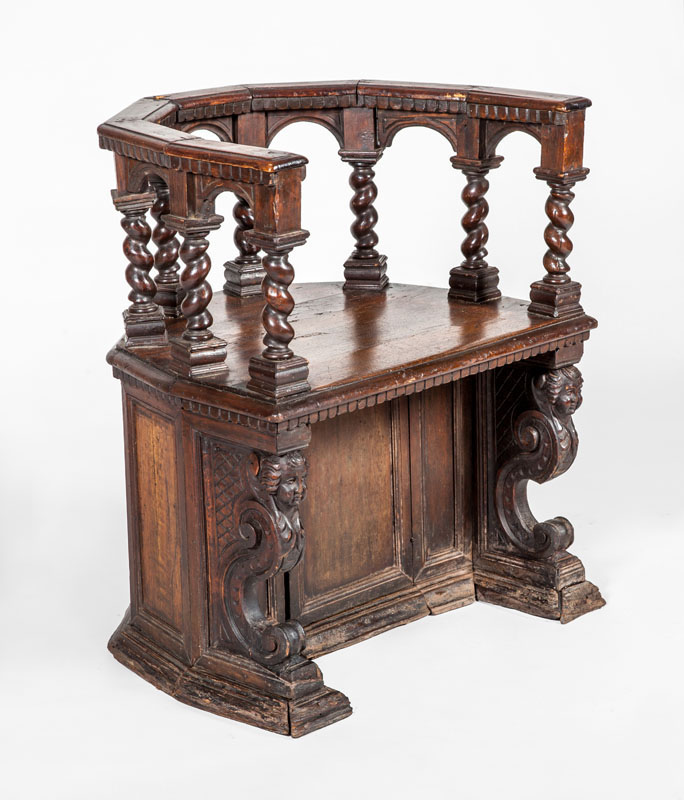 Appraisal: CONTINENTAL CARVED WALNUT TUB CHAIR PROBABLY ITALIAN On scrolled putti