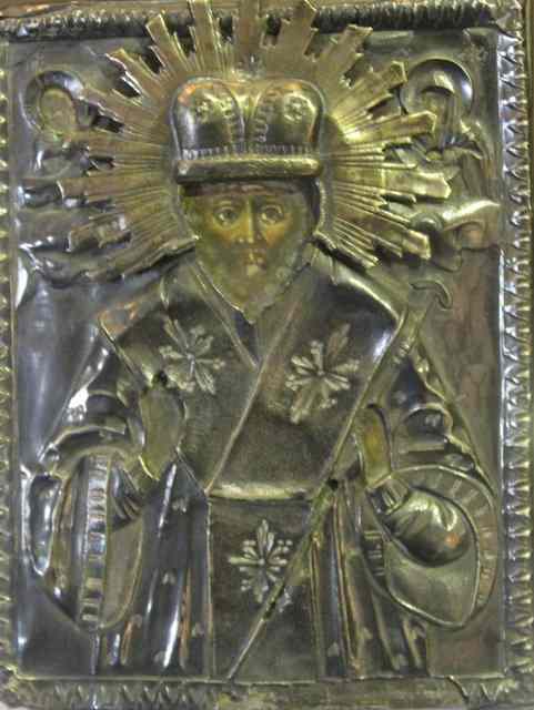 Appraisal: A RUSSIAN SMALL SILVER AND SILVER GILT ICON depicting Saint