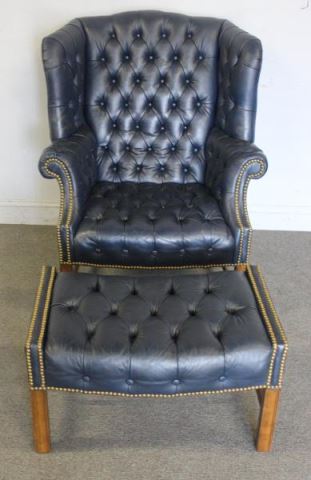 Appraisal: Tufted Blue Leather Wing Back Chair and Ottoman Labeled Drexel