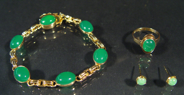 Appraisal: ct gold green stone bracelet matching ring and earrings