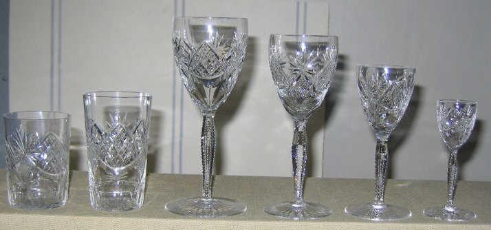 Appraisal: CONTINENTAL CUT GLASS STEMWARE SERVICE Diamond and fan motifs on