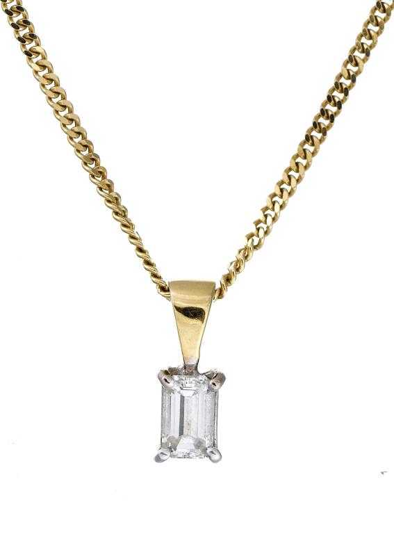 Appraisal: A DIAMOND PENDANT with an emerald cut diamond mounted in