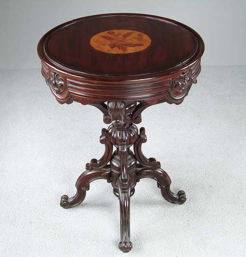 Appraisal: FANCY ROSEWOOD CARVED ROUND STAND WITH INLAID TOP Round inlay