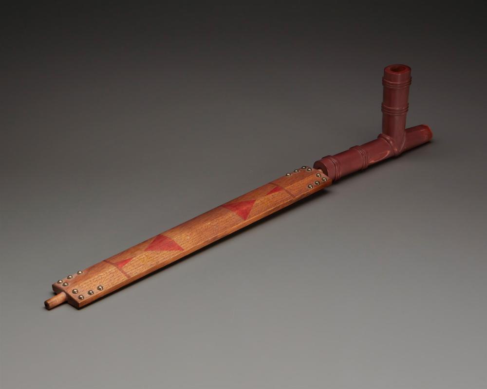 Appraisal: A Plains catlinite pipe and stem th Century A carved