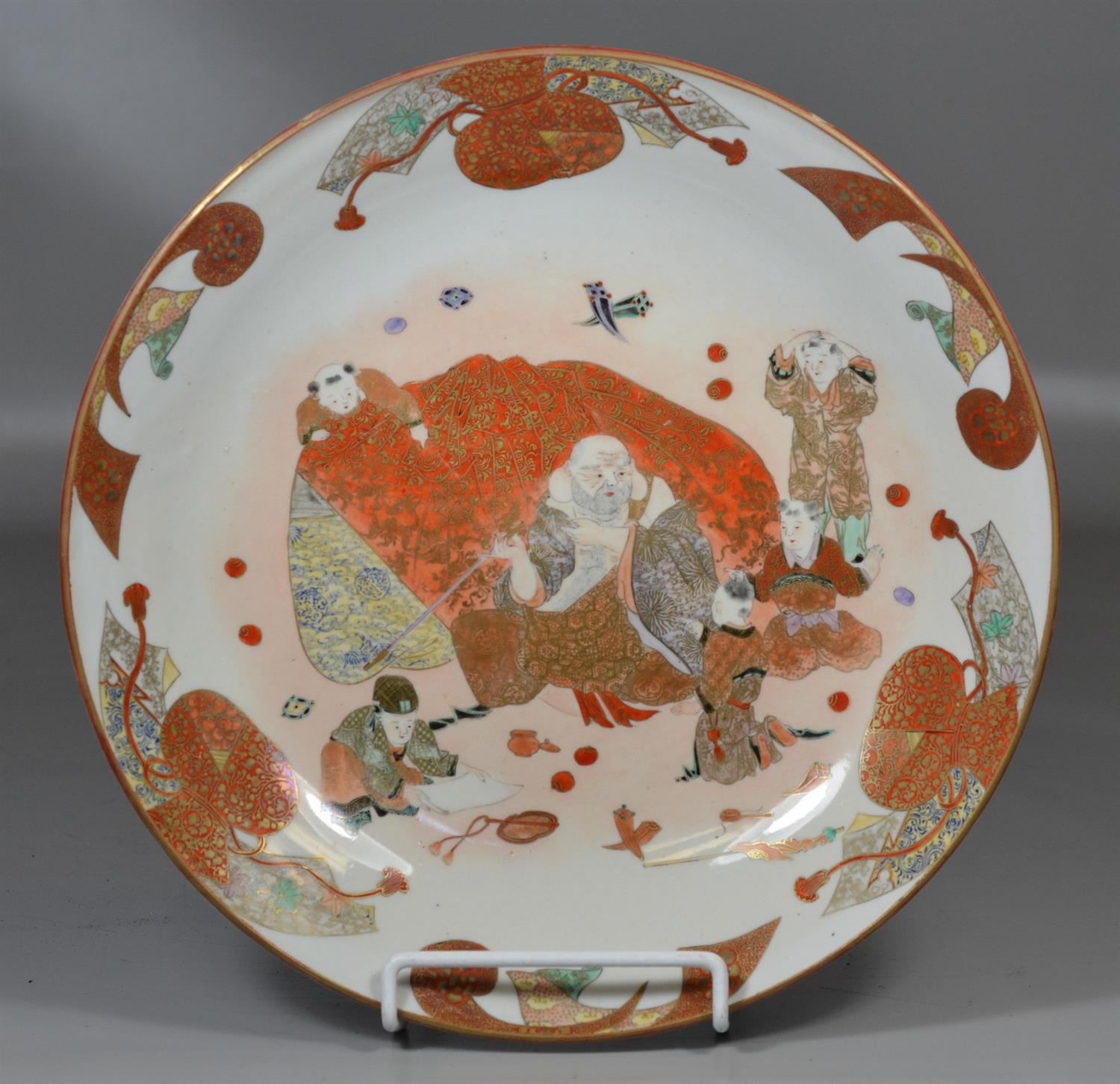 Appraisal: Japanese Kutani charger depicting a scribe and attendants with floral