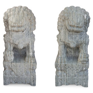 Appraisal: A Pair of Large Chinese Carved Green Marble Fu-Lions Height