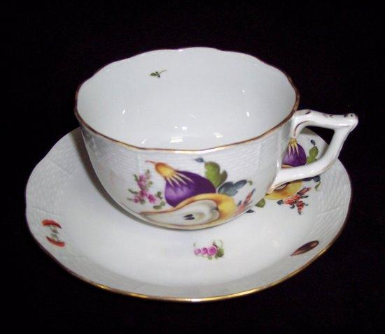 Appraisal: A Herend breakfast cup and saucer decorated fruit and butterflies