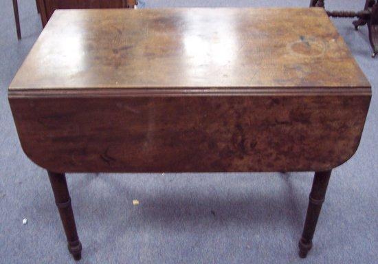 Appraisal: A George IV Pembroke table the rectangular top flanked two