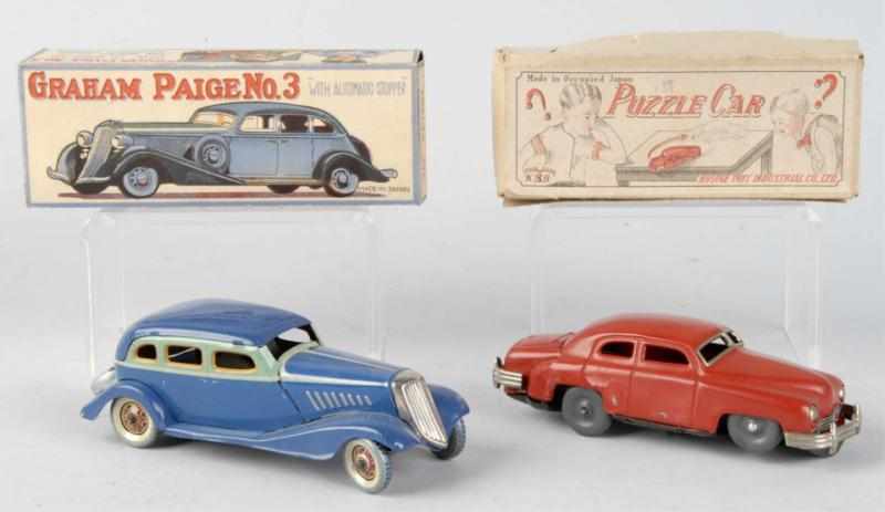 Appraisal: Lot of Tin Automobile Wind-Up Toys Excellent Largest - L