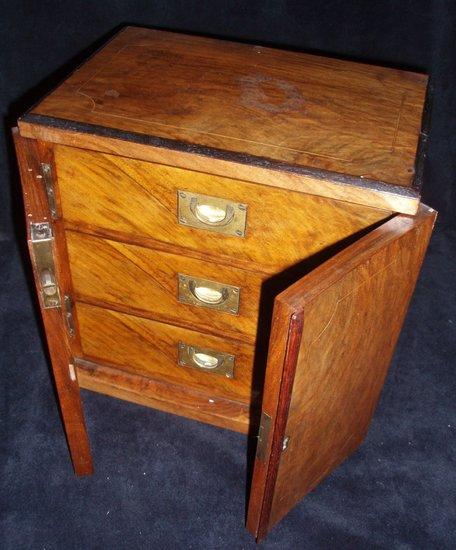 Appraisal: A small Edwardian walnut and boxwood strung cabinet the cupboard