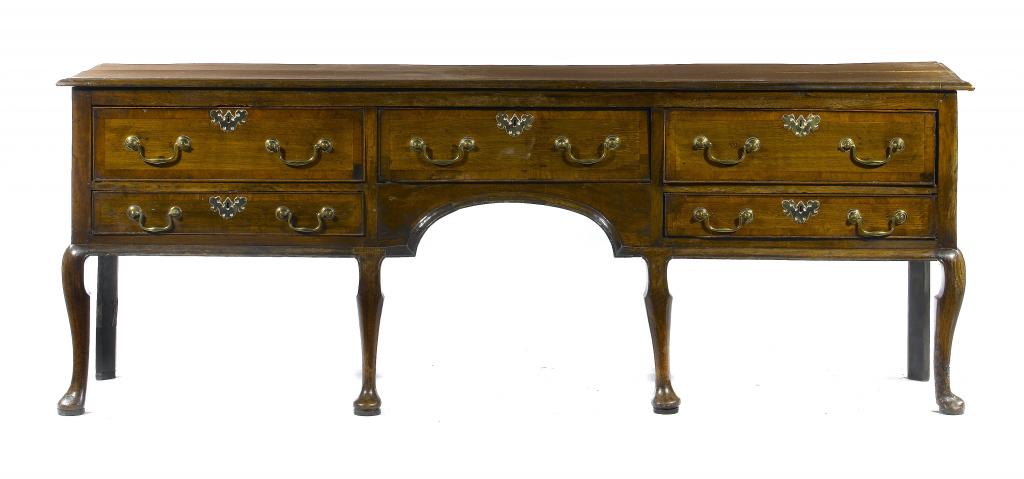 Appraisal: A GEORGE III OAK DRESSER the five cockbeaded drawers crossbanded