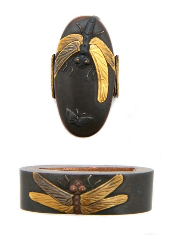 Appraisal: A Dragon Fly Fuchi-Kashira the insects rendered in copper and