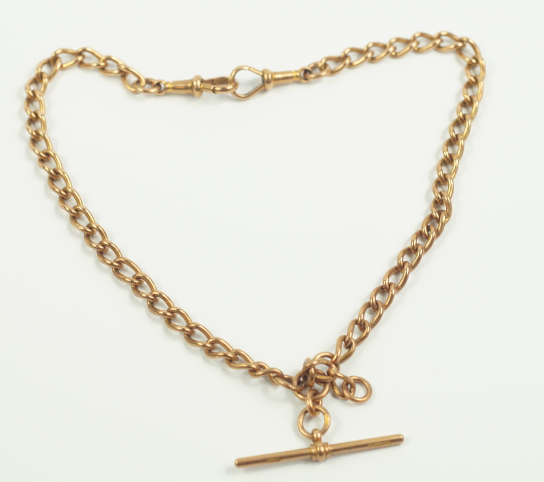 Appraisal: A ct rose gold curb link Albert chain with T